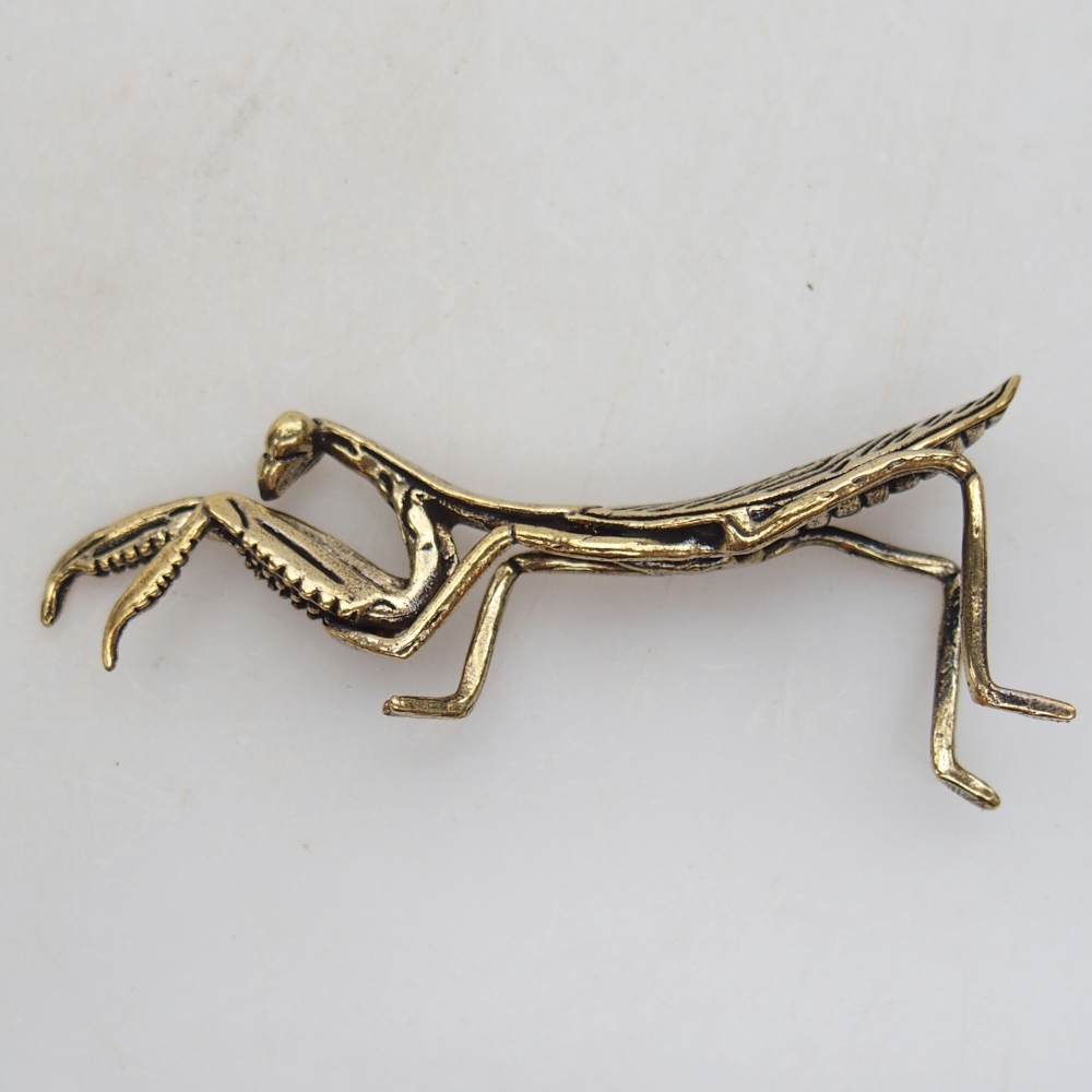 Kovová figúrka - kudlanka